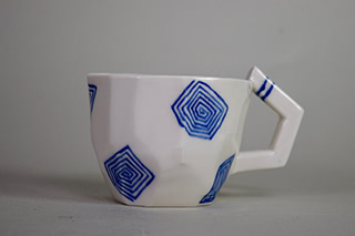 mug with blue pattern.
