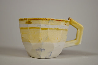 white and yellow mug.