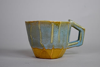 yellow and blue mug.